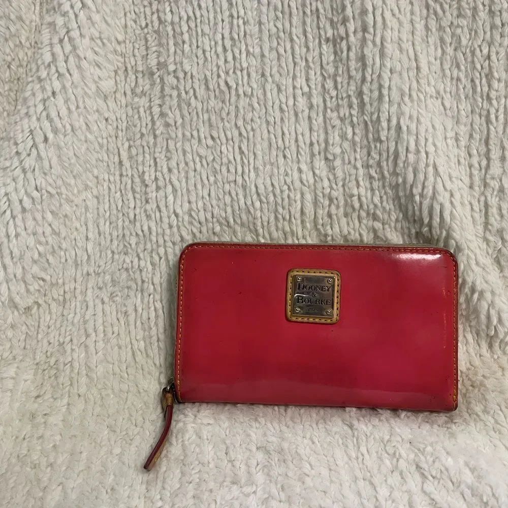 Dooney & Bourke patent leather orange all around Wallet.